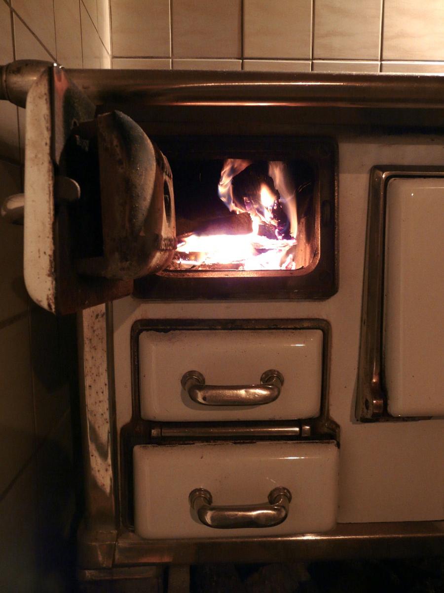 The fire in the wood stove heats the Appalachian room